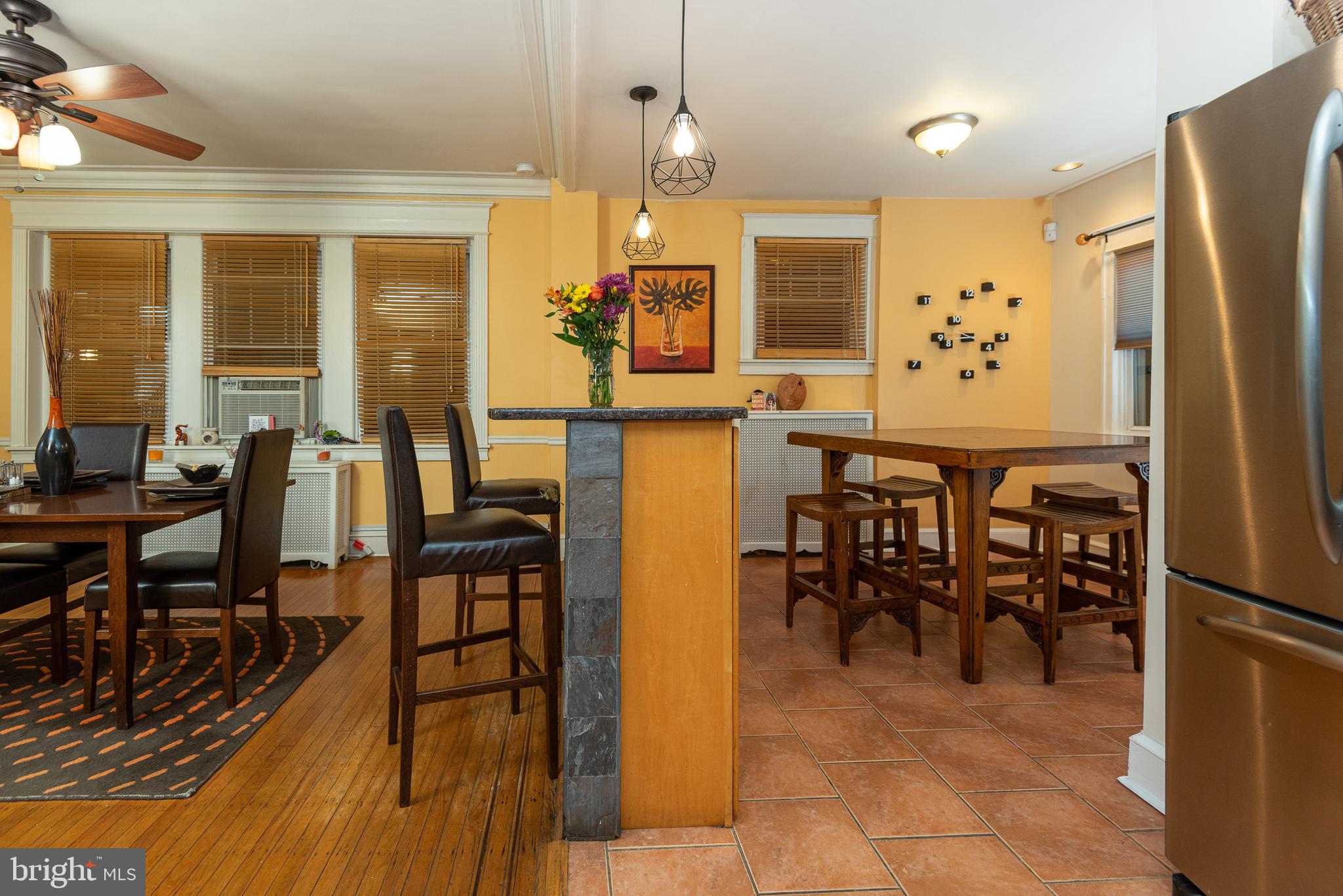 426 Glen Echo Road Philadelphia, PA 19119 - Photo 34 of 77 a view of a dining area with furniture window and wooden floor