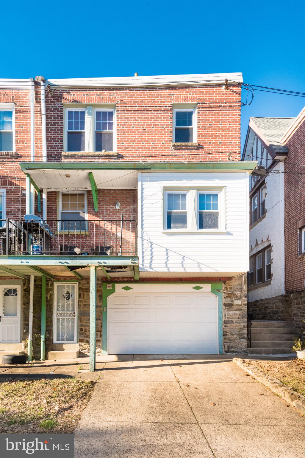 426 Glen Echo Road Philadelphia, PA 19119 - Photo 5 of 77 a front view of a house with a swimming pool