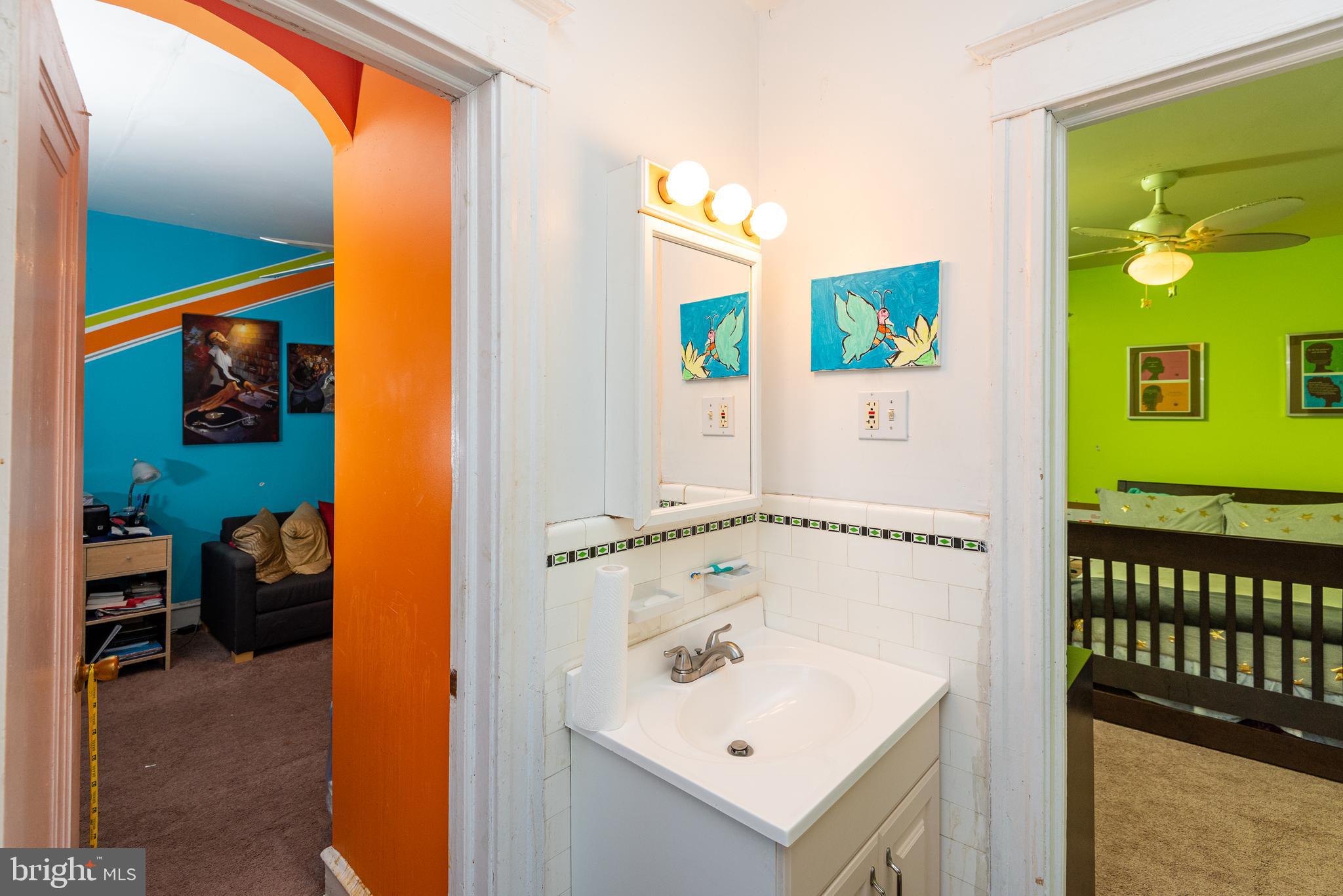 426 Glen Echo Road Philadelphia, PA 19119 - Photo 45 of 77 a bathroom with a sink and a mirror