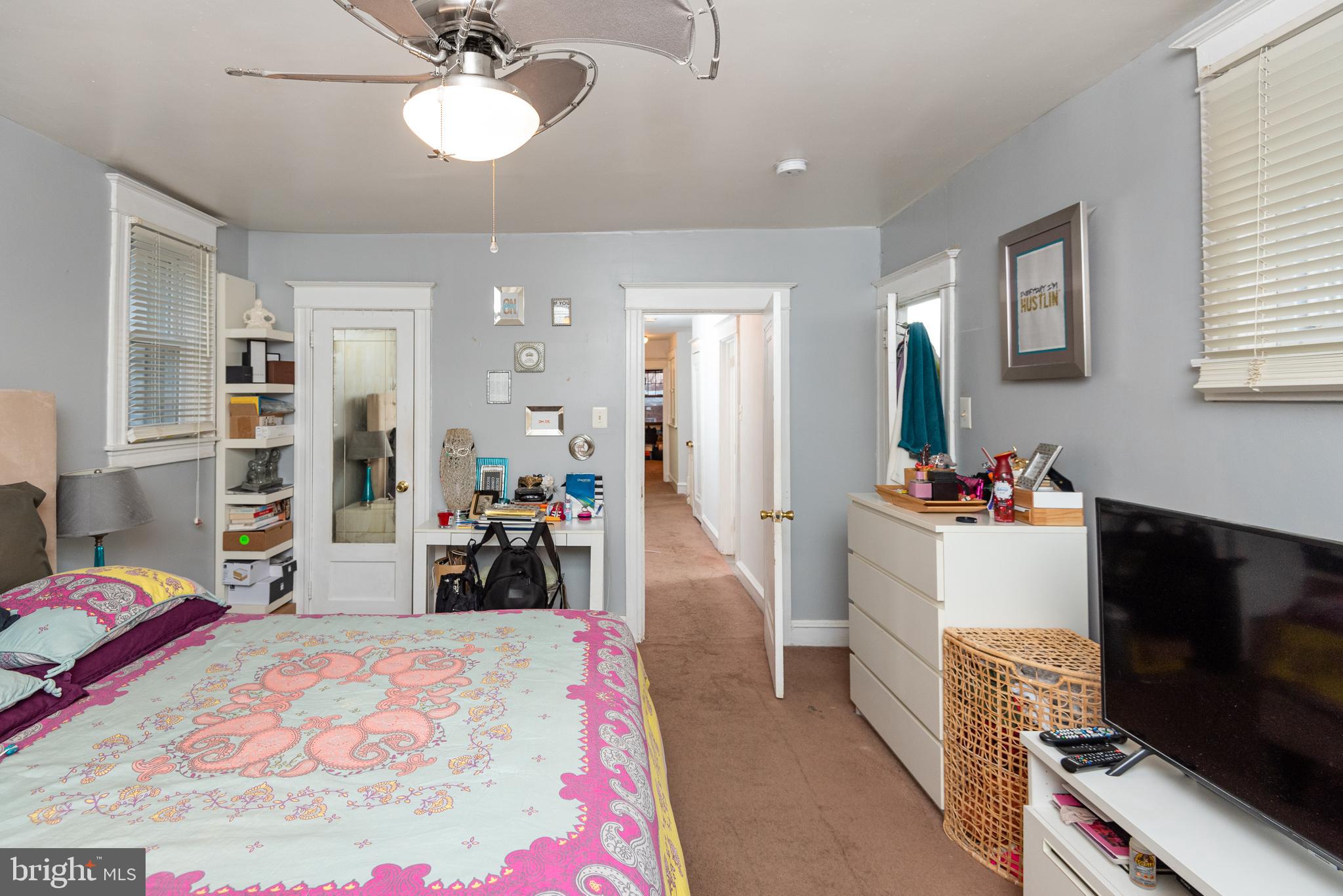 426 Glen Echo Road Philadelphia, PA 19119 - Photo 54 of 77 a bedroom with furniture and a flat screen tv