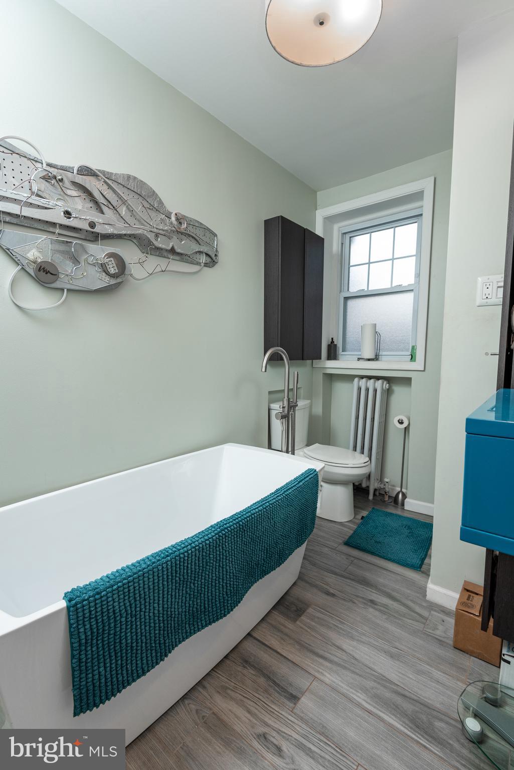 426 Glen Echo Road Philadelphia, PA 19119 - Photo 56 of 77 a living room with furniture and a wooden floor