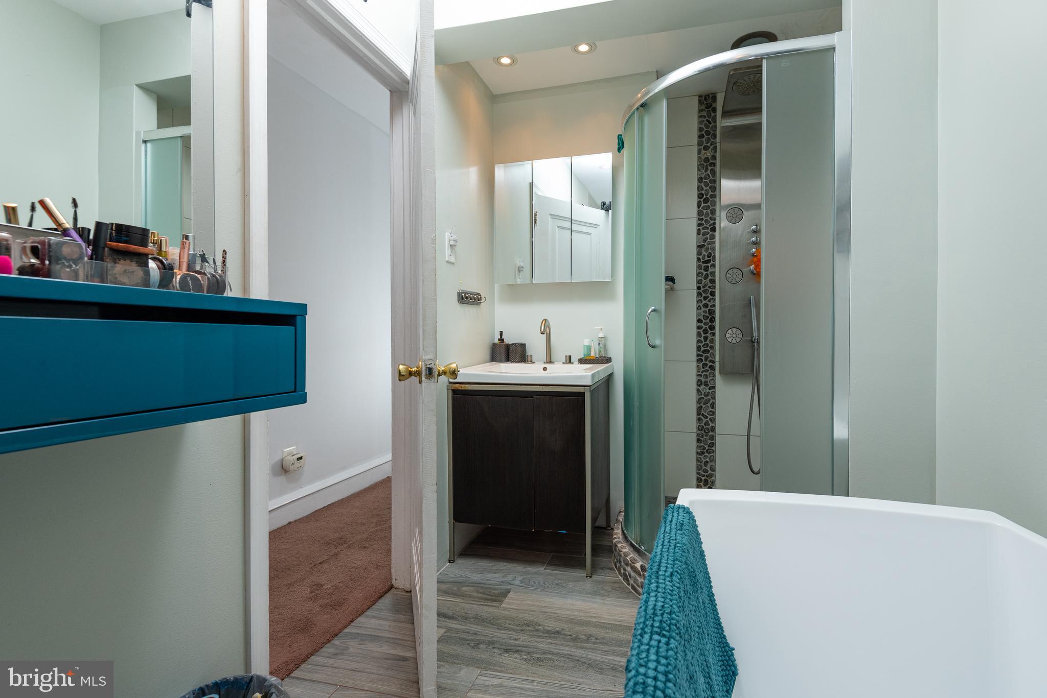 426 Glen Echo Road Philadelphia, PA 19119 - Photo 59 of 77 a bathroom with a bathtub and a sink