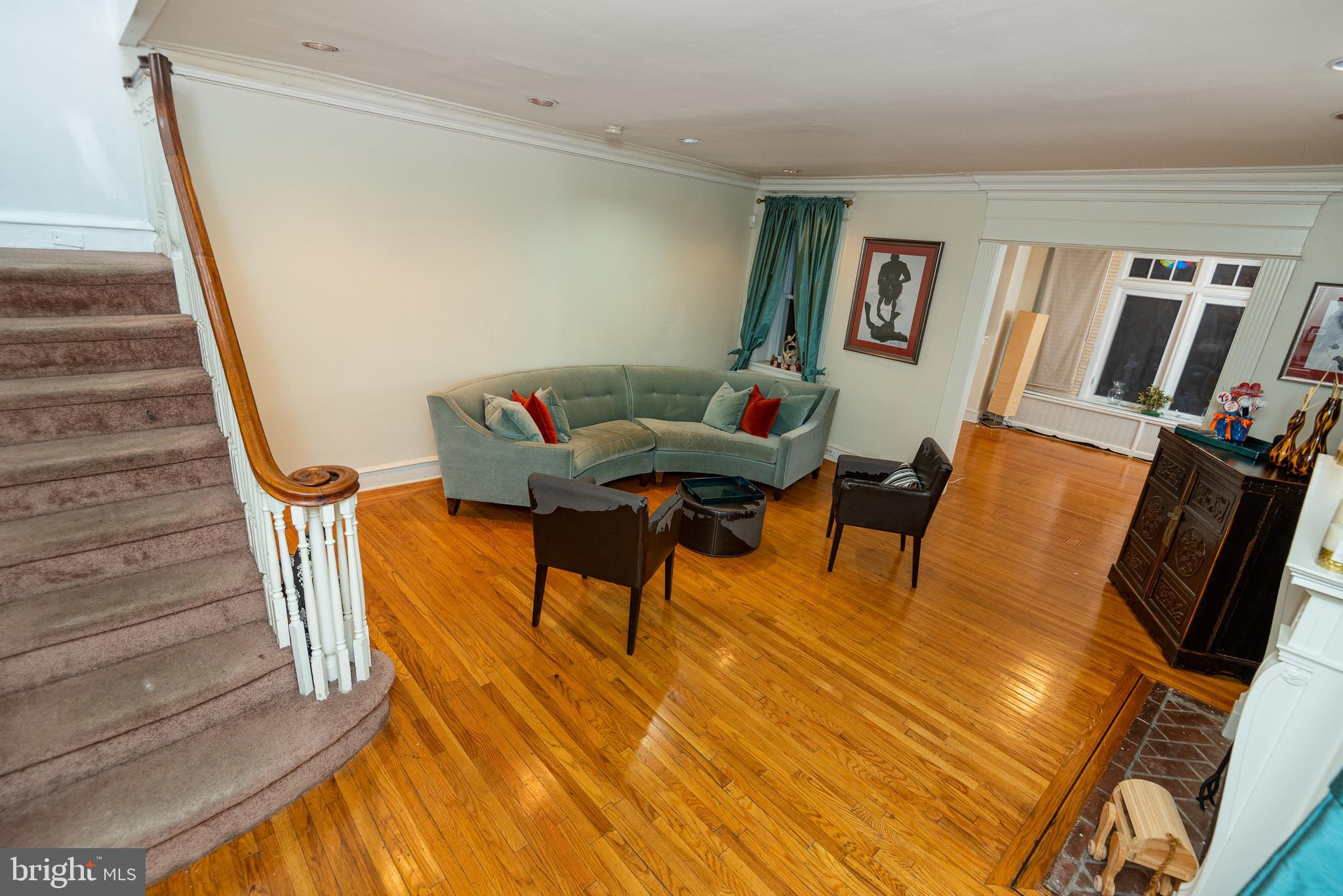 426 Glen Echo Road Philadelphia, PA 19119 - Photo 8 of 77 a living room with furniture and a flat screen tv