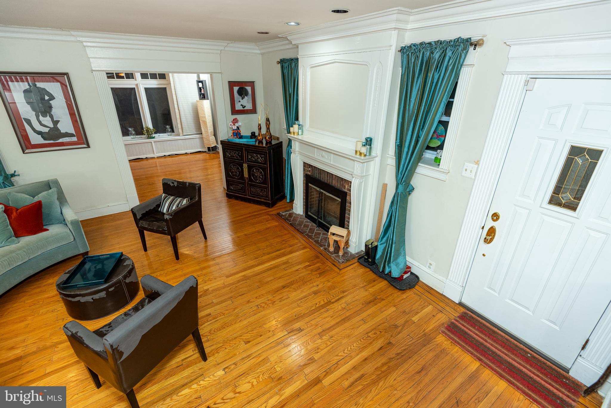 426 Glen Echo Road Philadelphia, PA 19119 - Photo 9 of 77 a bedroom with furniture and a wooden floor