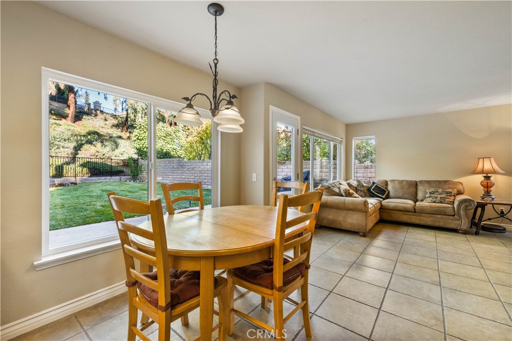 27729 Villa Canyon Road Castaic, CA 91384 - Photo 26 of 72 a view of a dining room with furniture window and outside view