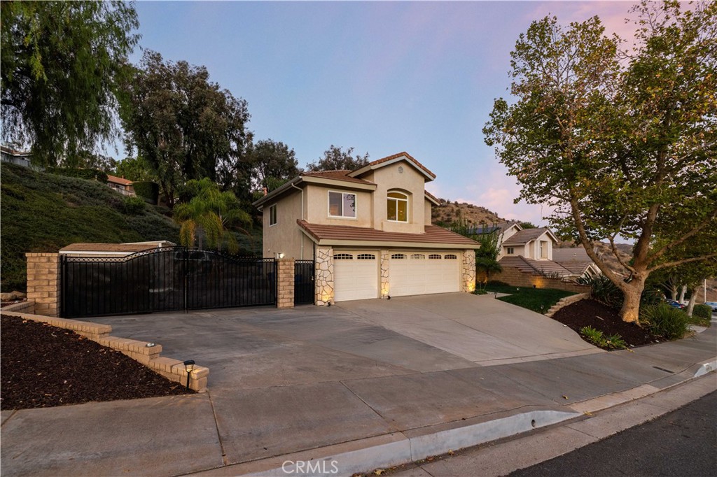 27729 Villa Canyon Road Castaic, CA 91384 - Photo 3 of 72 a front view of a house with a yard