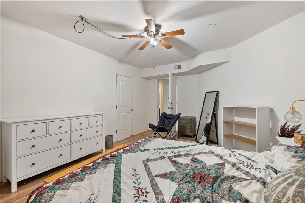 27729 Villa Canyon Road Castaic, CA 91384 - Photo 33 of 72 a bed room with a bed and a dresser