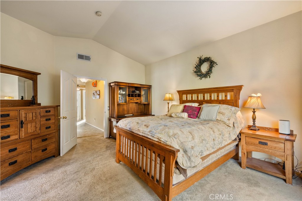 27729 Villa Canyon Road Castaic, CA 91384 - Photo 40 of 72 a bedroom with a bed and a dresser