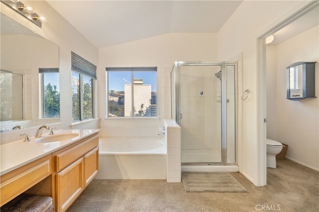 27729 Villa Canyon Road Castaic, CA 91384 - Photo 44 of 72 a spacious bathroom with a tub sink and a mirror