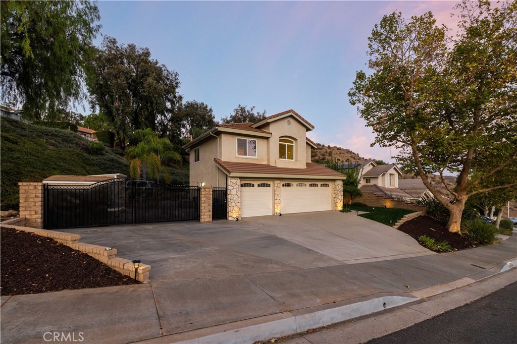 27729 Villa Canyon Road Castaic, CA 91384 - Photo 70 of 72 a front view of a house with a yard