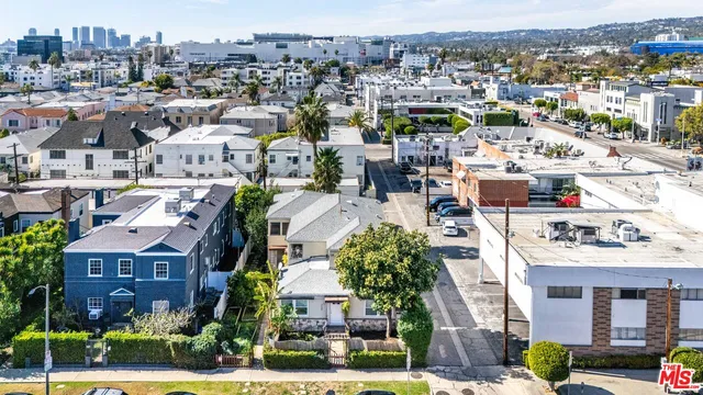 a aerial view of a house with a yard