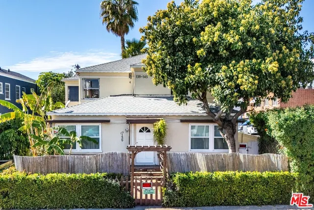 a view of house with outdoor space and sitting space