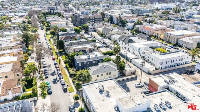 an aerial view of a city with lots of residential buildings