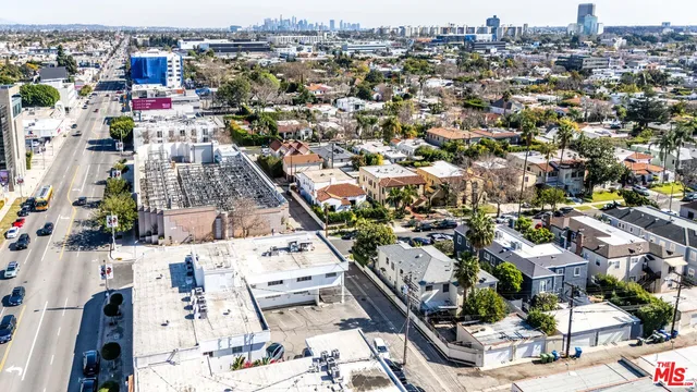 an aerial view of a city with lots of residential buildings