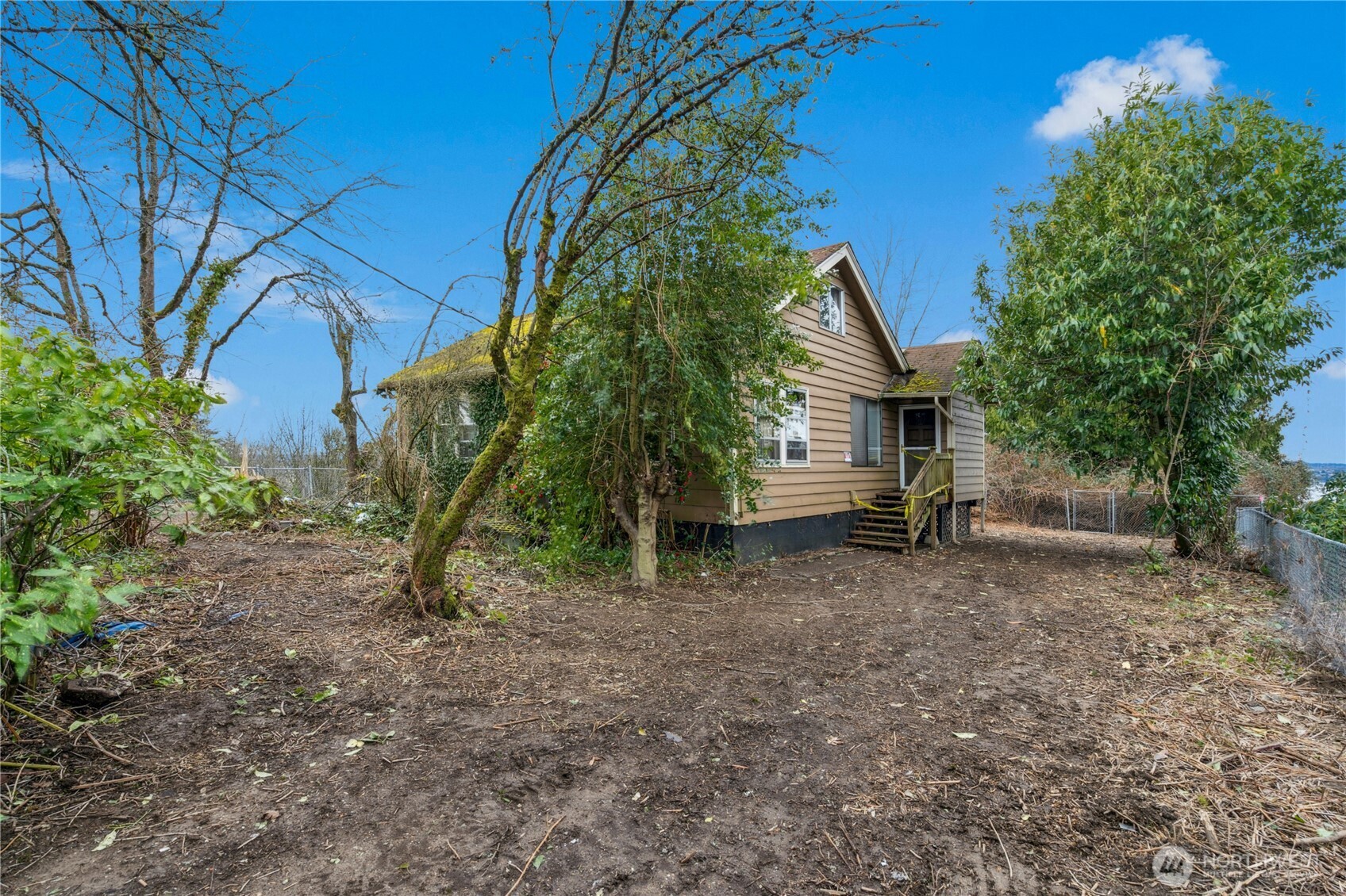 1409 North 24th Street Renton, WA 98056 - Photo 14 of 16 a view of a house with a backyard