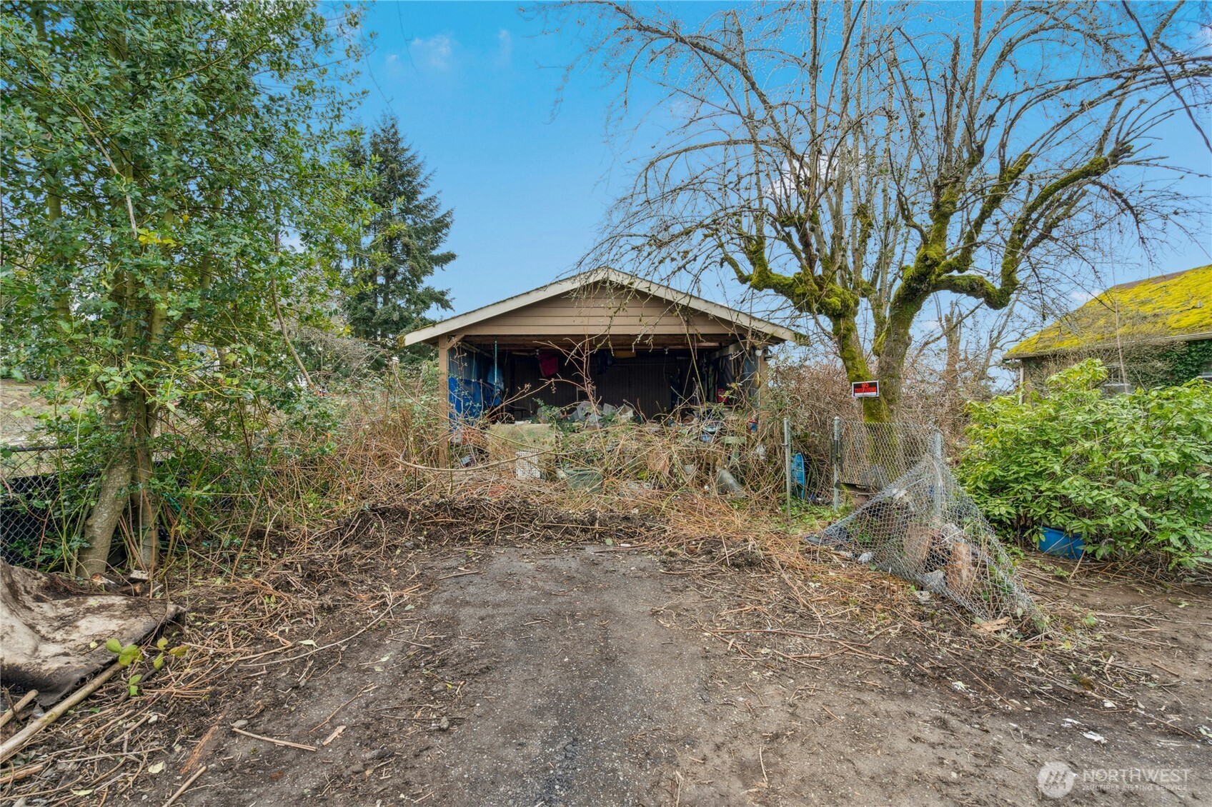 1409 North 24th Street Renton, WA 98056 - Photo 15 of 16 a backyard of a house with lots of green space