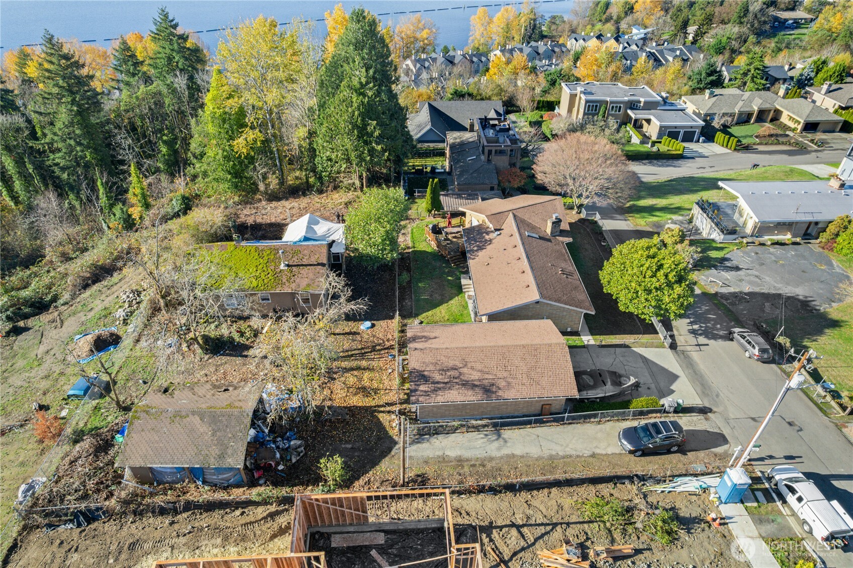 1409 North 24th Street Renton, WA 98056 - Photo 8 of 16 an aerial view of a house with a yard and lake view
