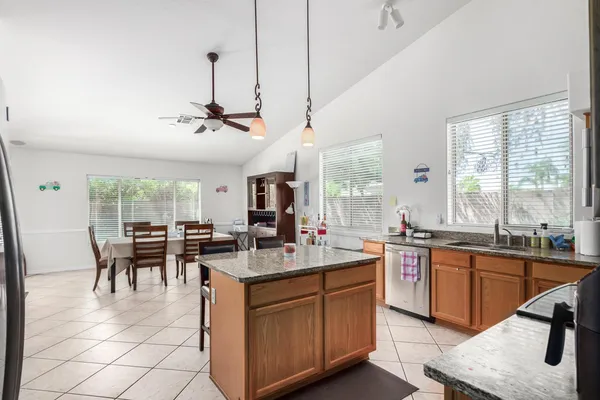 a very nice looking kitchen with a large window