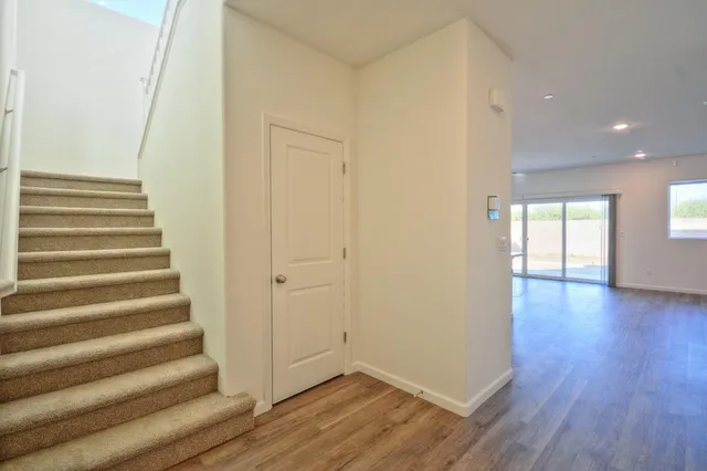 a view of entryway with wooden floor