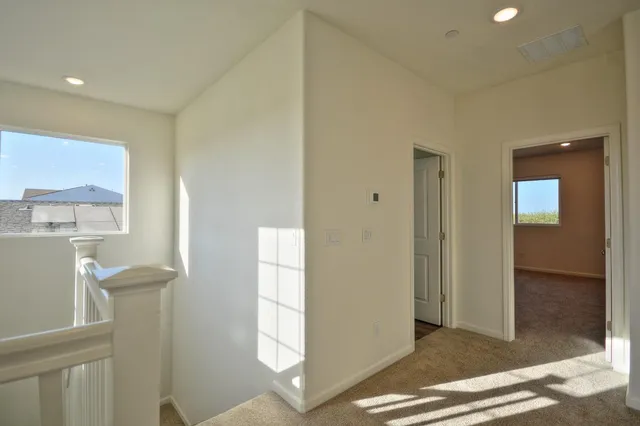 a view of entryway with kitchen