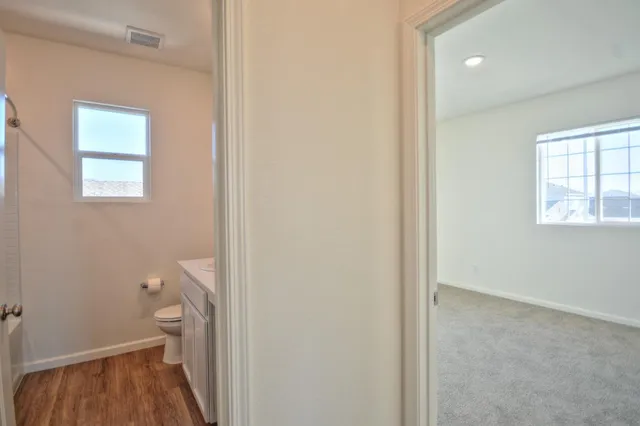 an empty room with windows