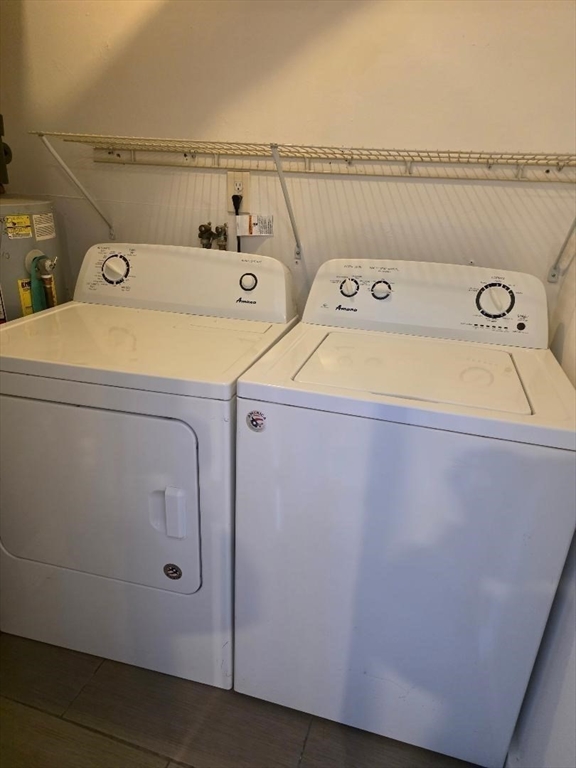 24 Harvard Road, Unit C Ayer, MA 01432 - Photo 20 of 20 a utility room with dryer and washer