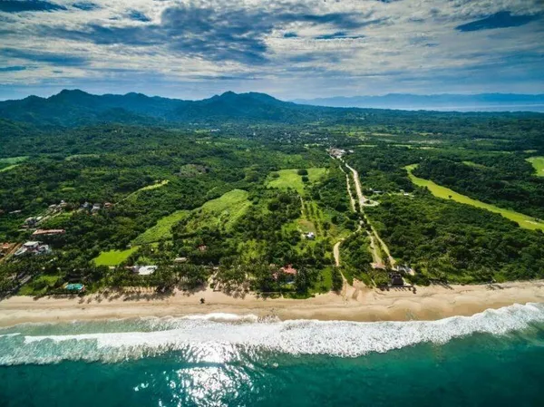 a view of a yard with a mountain