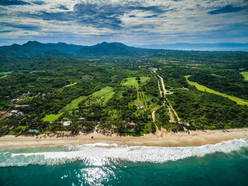 a view of a yard with a mountain