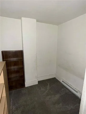 an empty room with closet