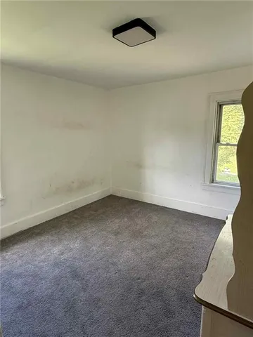 an empty room with a workbench