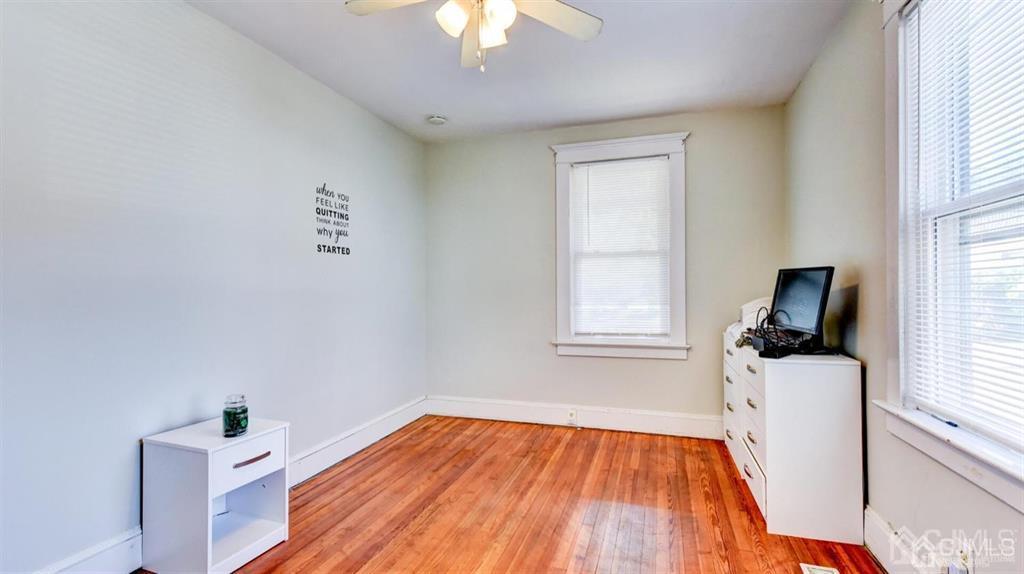 919 Hermann Road North Brunswick, NJ 08902 - Photo 4 of 13 a room with a bed and a window