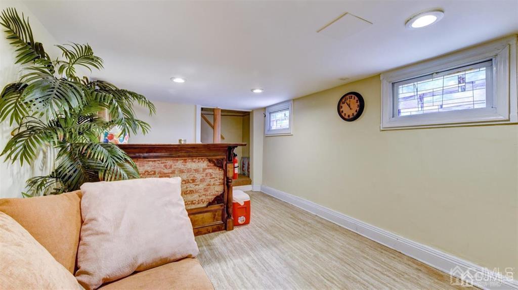 919 Hermann Road North Brunswick, NJ 08902 - Photo 5 of 13 a view of a livingroom with furniture and window