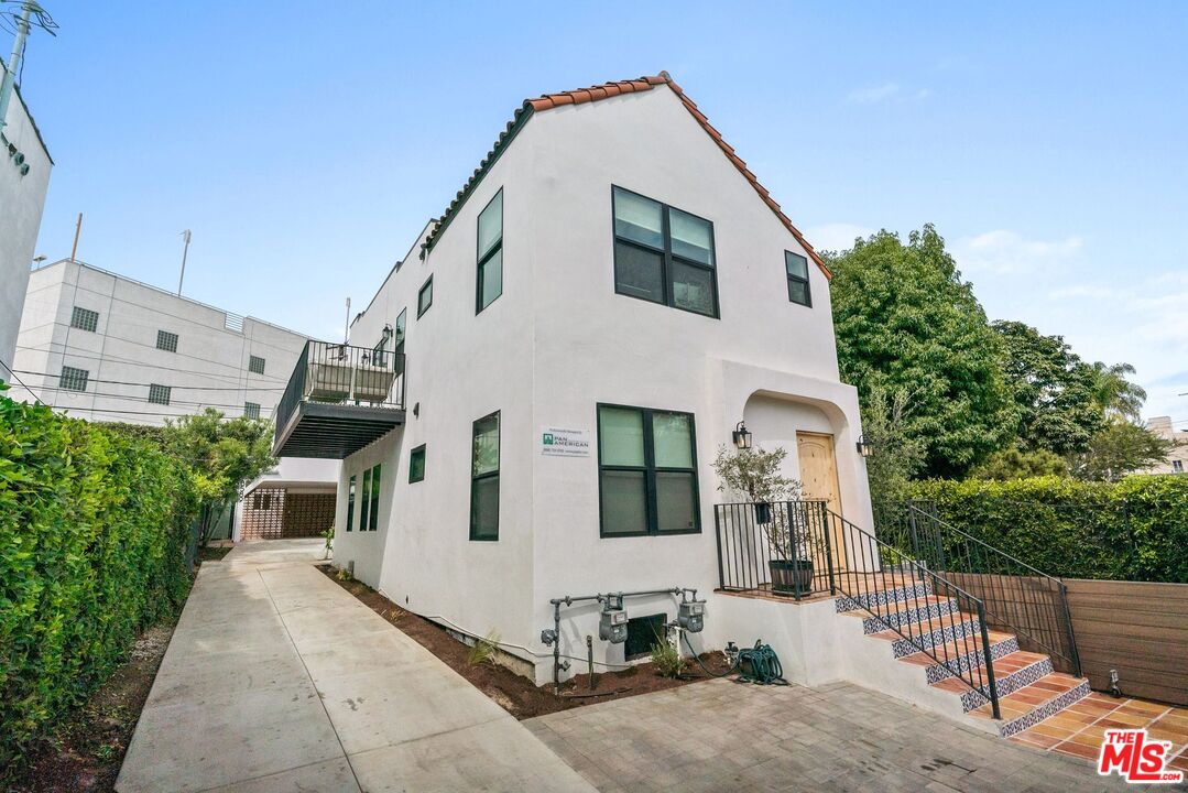 a front view of a house with a garage