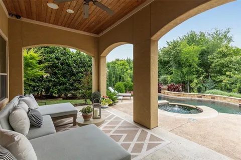 a outdoor living space with furniture and garden view
