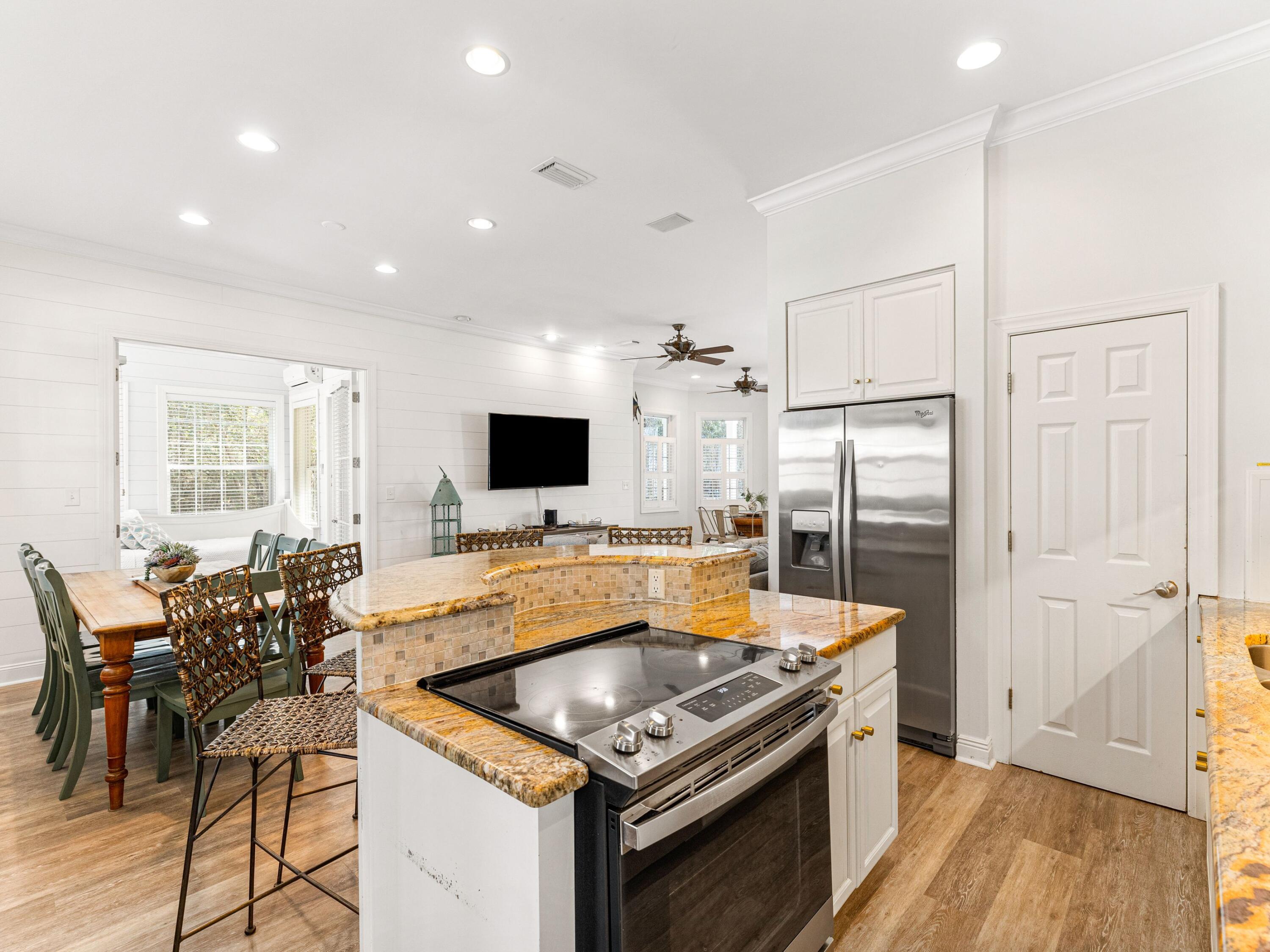 41 Winston Lane Inlet Beach, FL 32461 - Photo 26 of 50 a kitchen with stainless steel appliances granite countertop a sink and a refrigerator