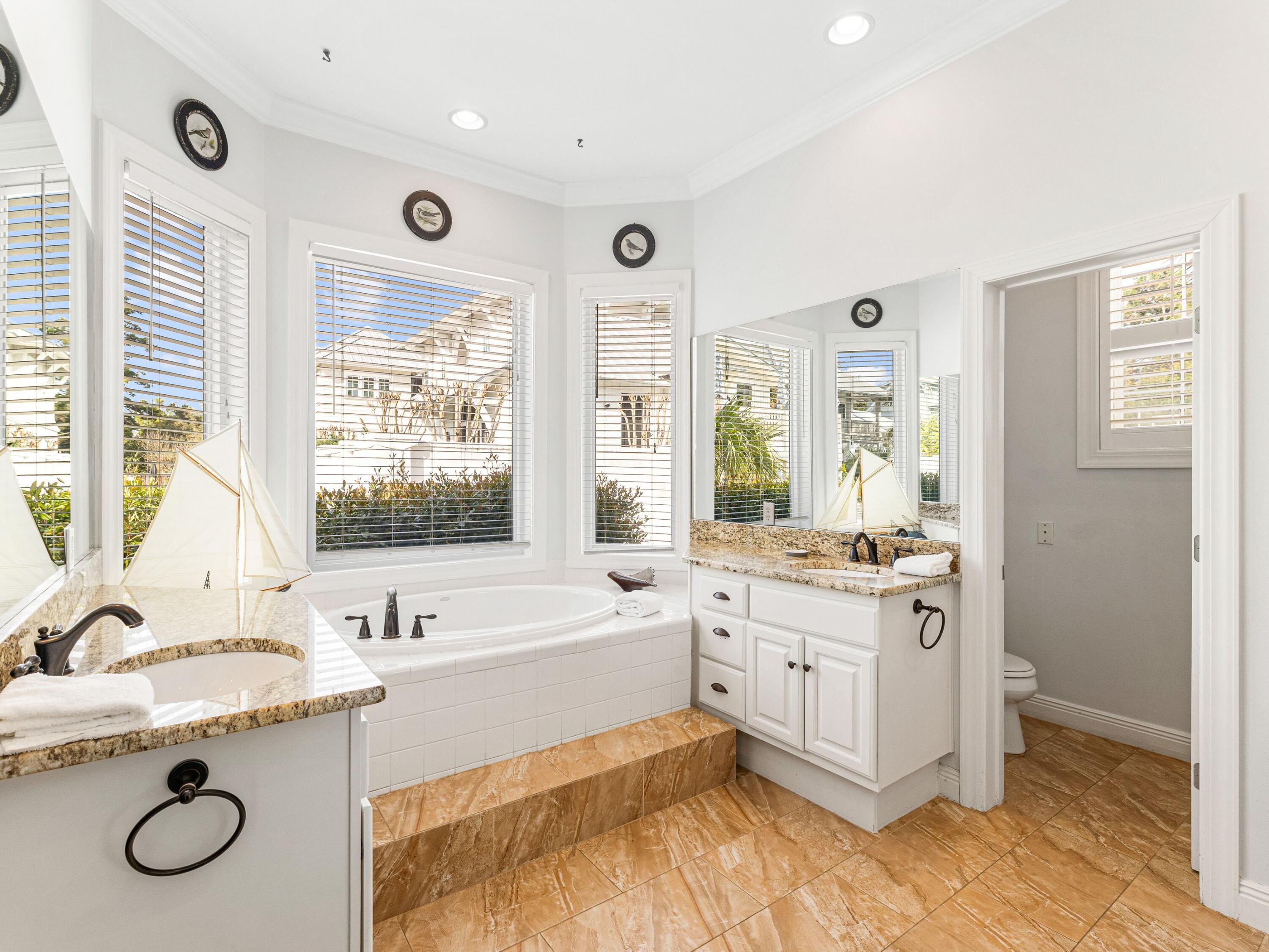 41 Winston Lane Inlet Beach, FL 32461 - Photo 36 of 50 a bathroom with a granite countertop sink double vanity and a tub