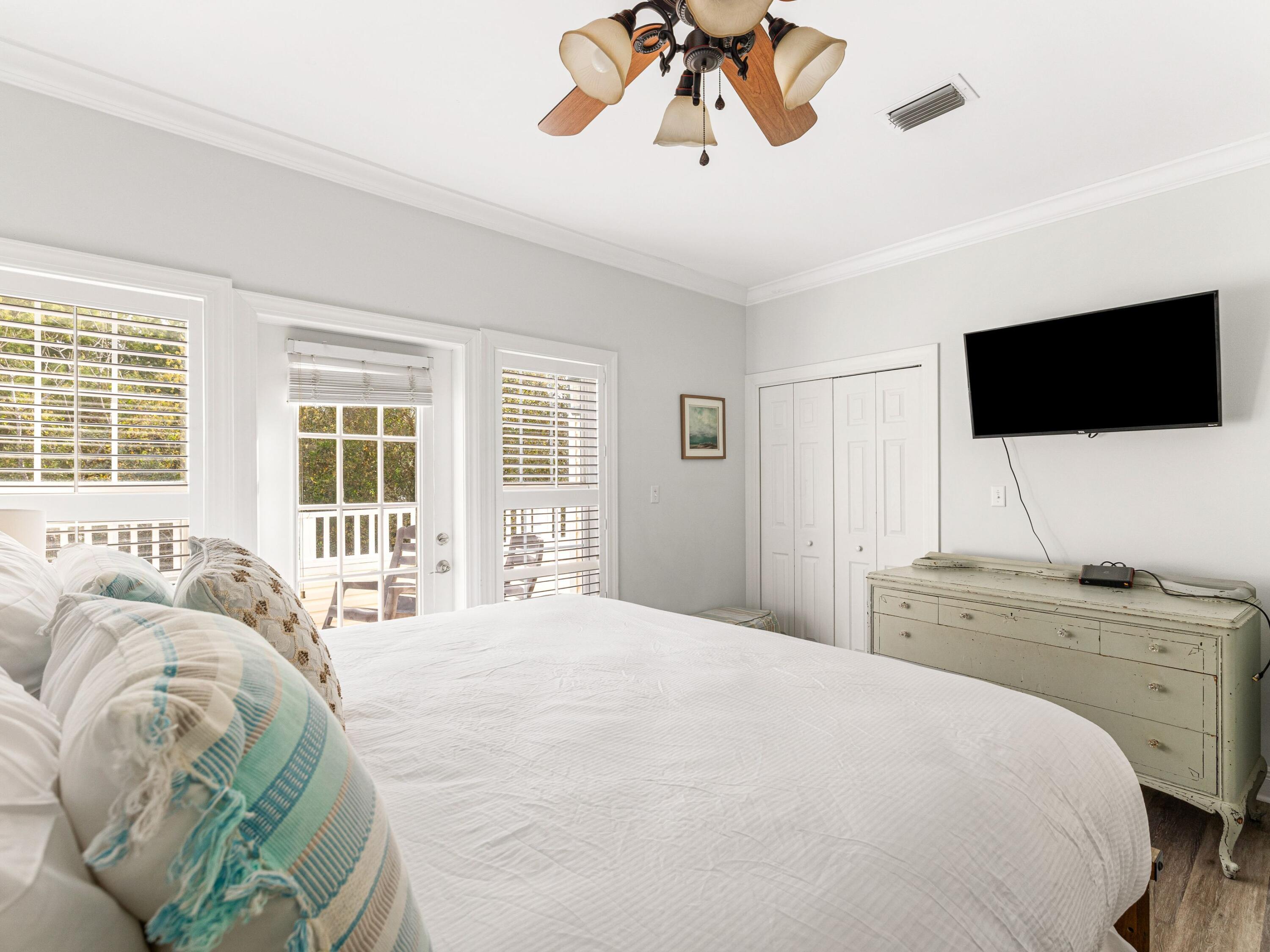 41 Winston Lane Inlet Beach, FL 32461 - Photo 38 of 50 a bedroom with a bed and a flat screen tv