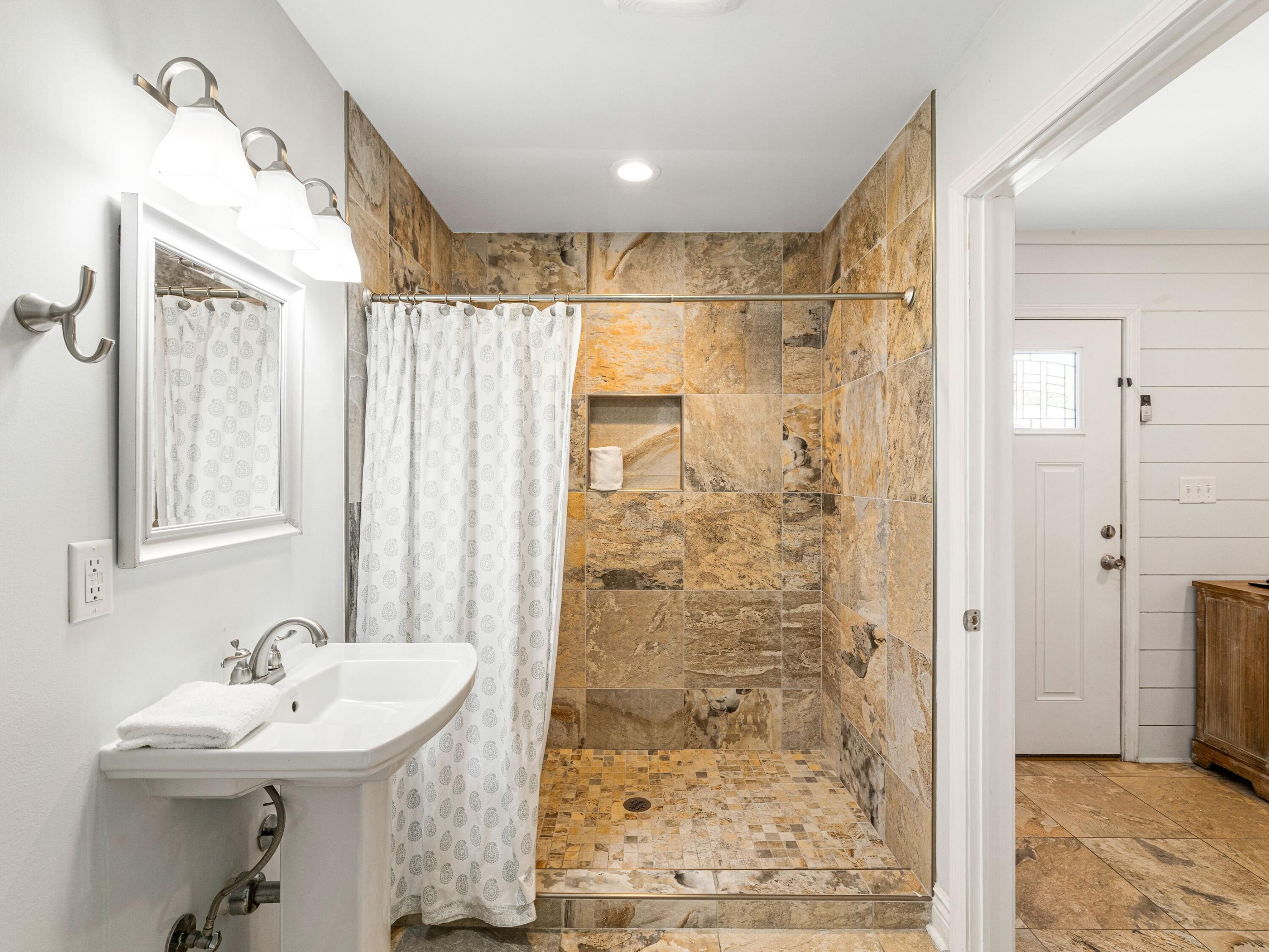 41 Winston Lane Inlet Beach, FL 32461 - Photo 49 of 50 a bathroom with a sink shower and a mirror