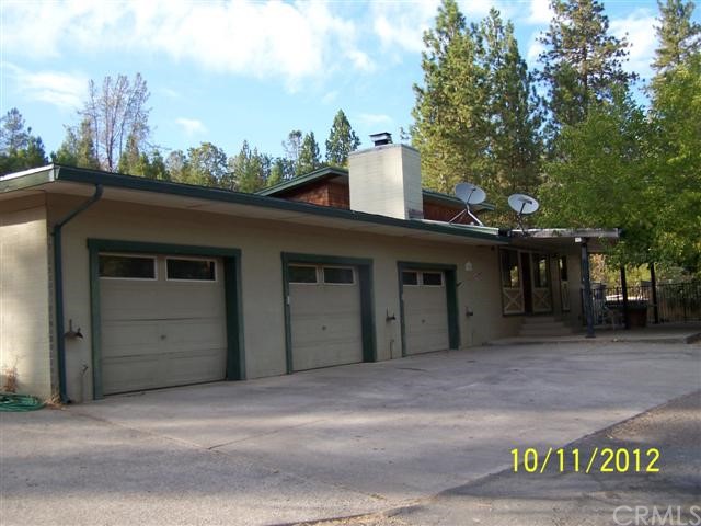 11940 Anderson Springs Road Middletown, CA 95461 - Photo 1 of 1 Front of home w/three-car garage.