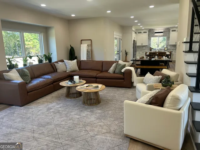 a kitchen with a table and chairs in it