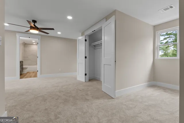 a swimming pool with outdoor seating and yard