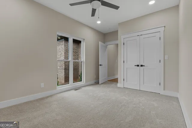 a bathroom with a toilet and a sink