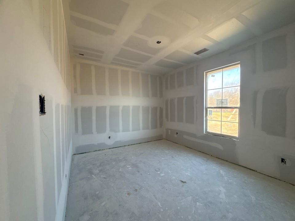 8779 County Road 623 Blue Ridge, TX 75424 - Photo 4 of 16 an empty room with a empty space and windows