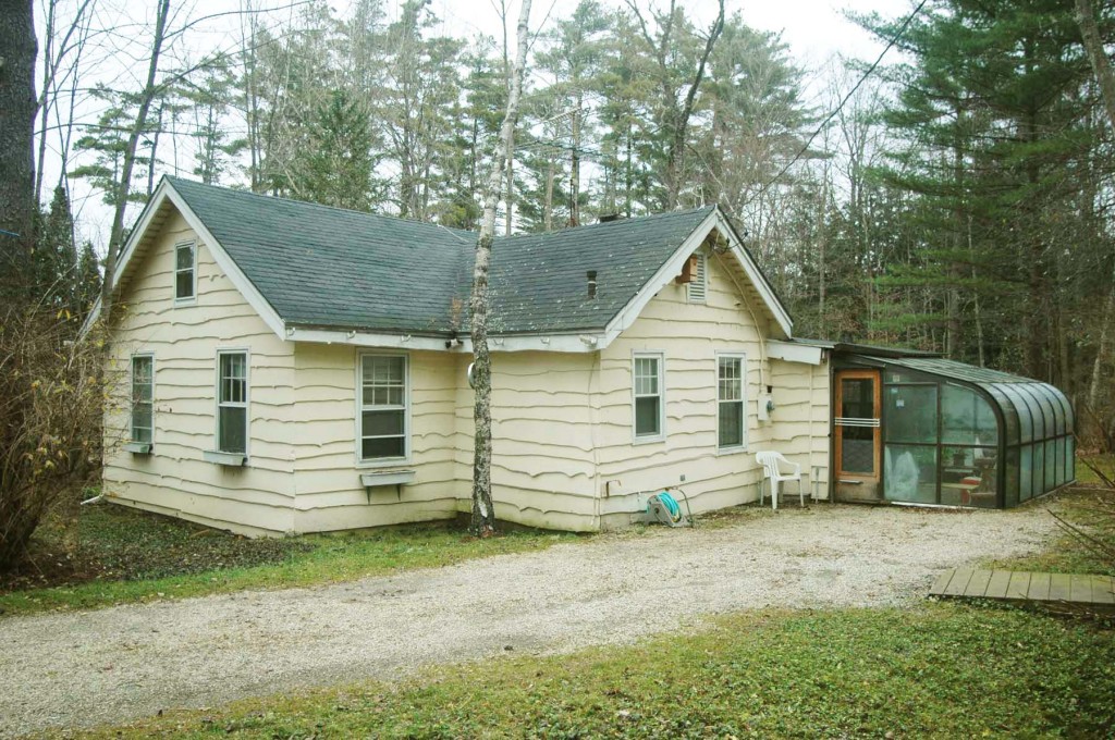8 Grove Road Stockbridge, MA 01262 - Photo 1 of 5 a view of a house with a yard