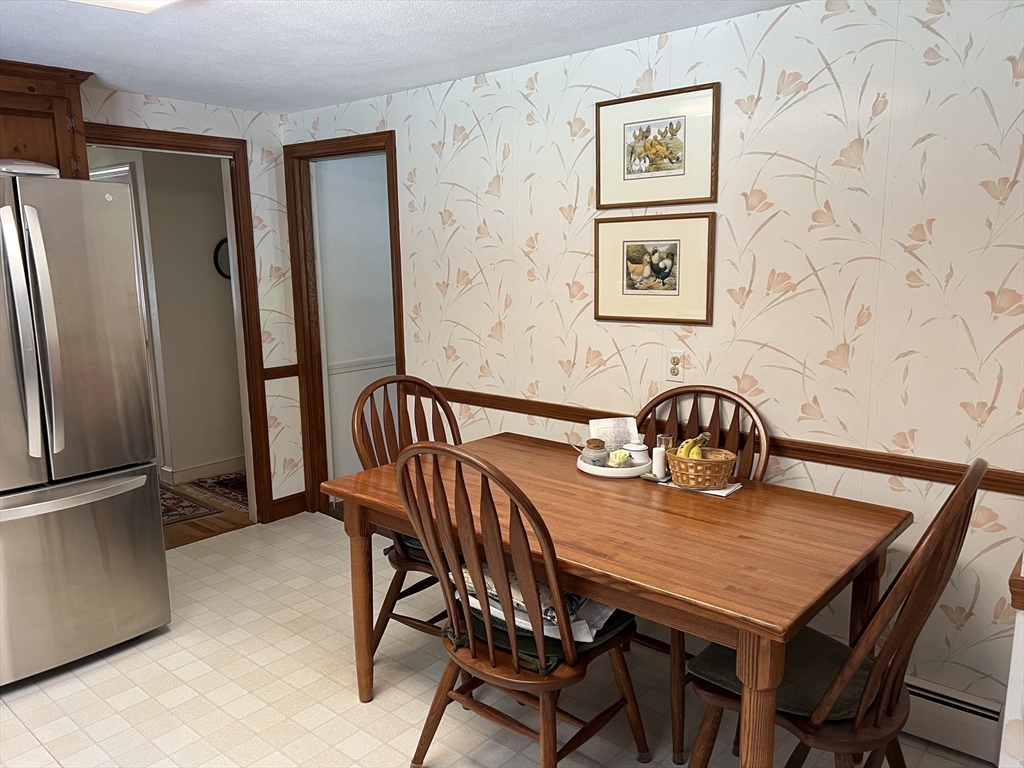 71 Greenbrook Road Hamilton, MA 01982 - Photo 15 of 33 a view of a dining room with furniture