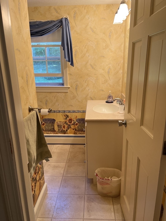 71 Greenbrook Road Hamilton, MA 01982 - Photo 18 of 33 a bathroom with a sink and toilet