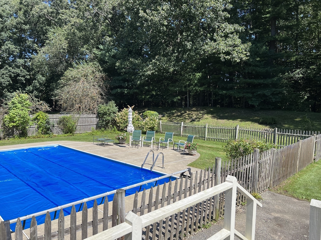 71 Greenbrook Road Hamilton, MA 01982 - Photo 30 of 33 a view of a swimming pool with a patio