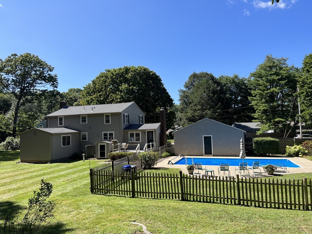 71 Greenbrook Road Hamilton, MA 01982 - Photo 4 of 33 a house view with a garden space