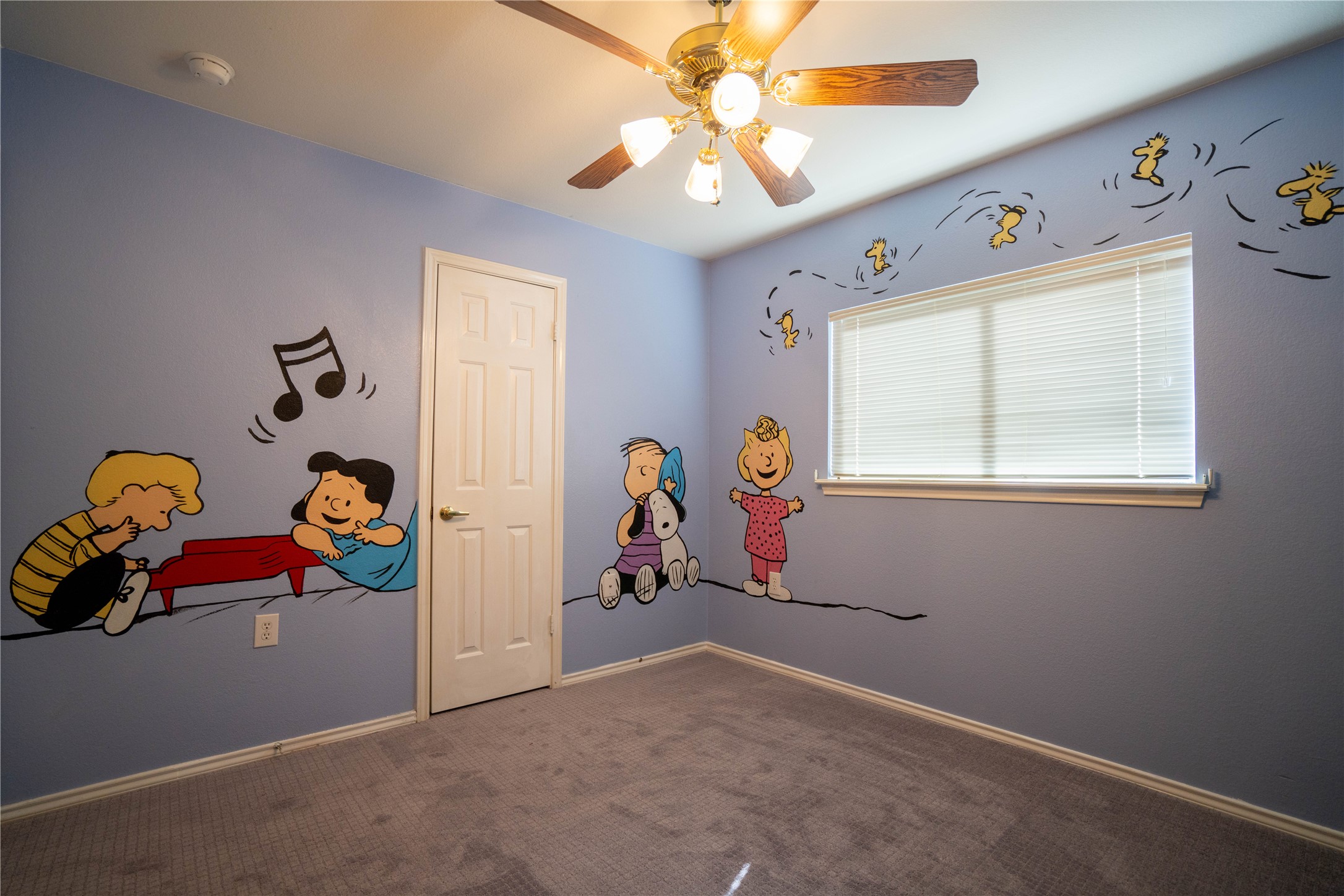 7516 Cats-Eye Lane Austin, TX 78747 - Photo 19 of 30 an empty room with toys and wooden floor