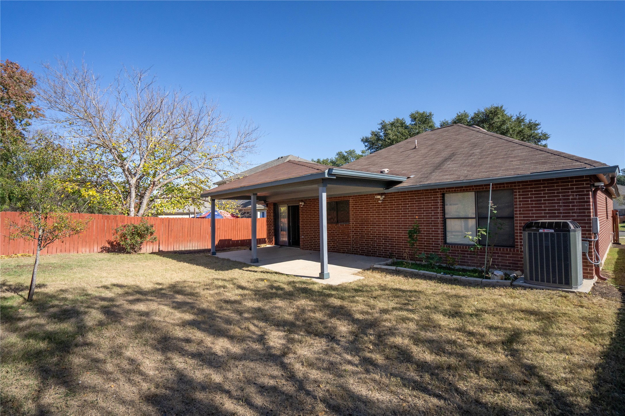 7516 Cats-Eye Lane Austin, TX 78747 - Photo 29 of 30 a house with yard in front of it